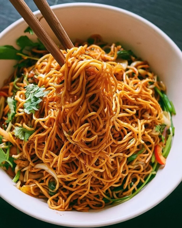 Delicious Classic Chinese Chow Mein served with fresh vegetables and protein.