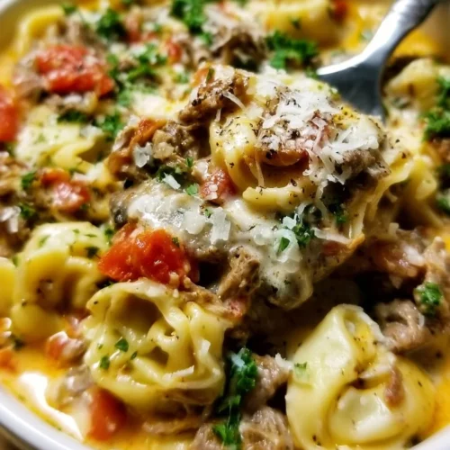 Slow Cooker Cheesesteak Tortellini with melted cheese and tender pasta
