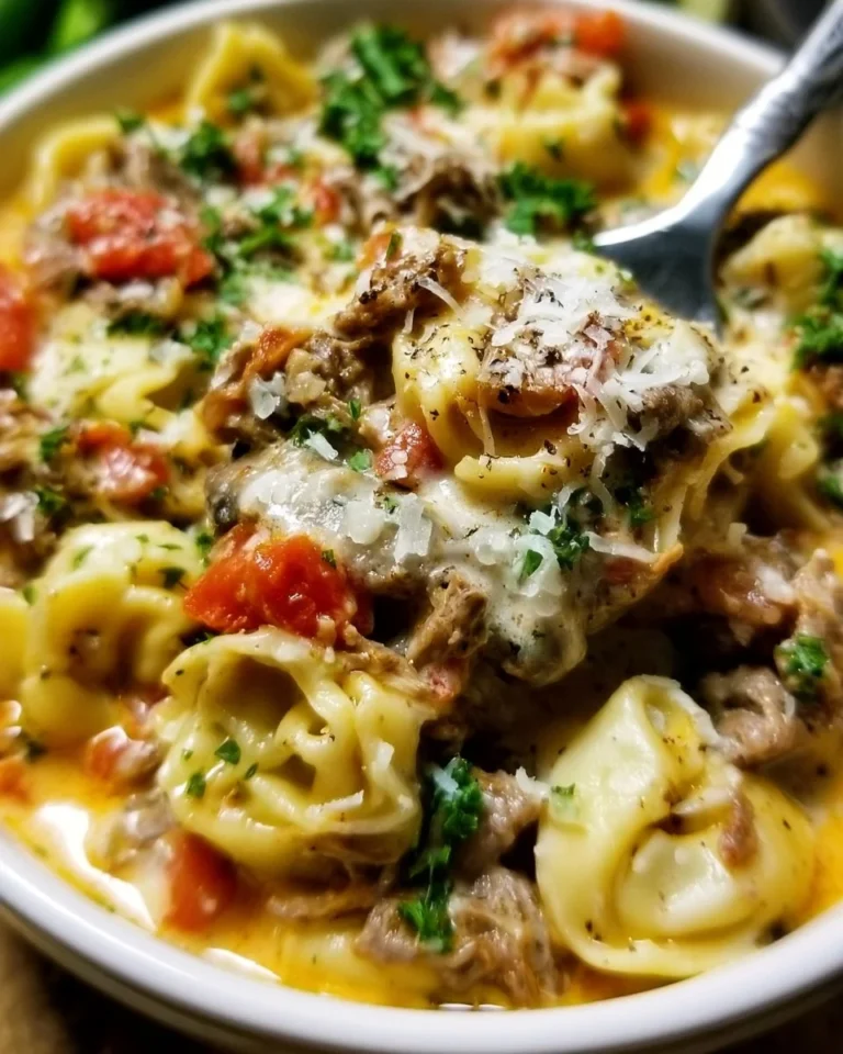 Slow Cooker Cheesesteak Tortellini with melted cheese and tender pasta