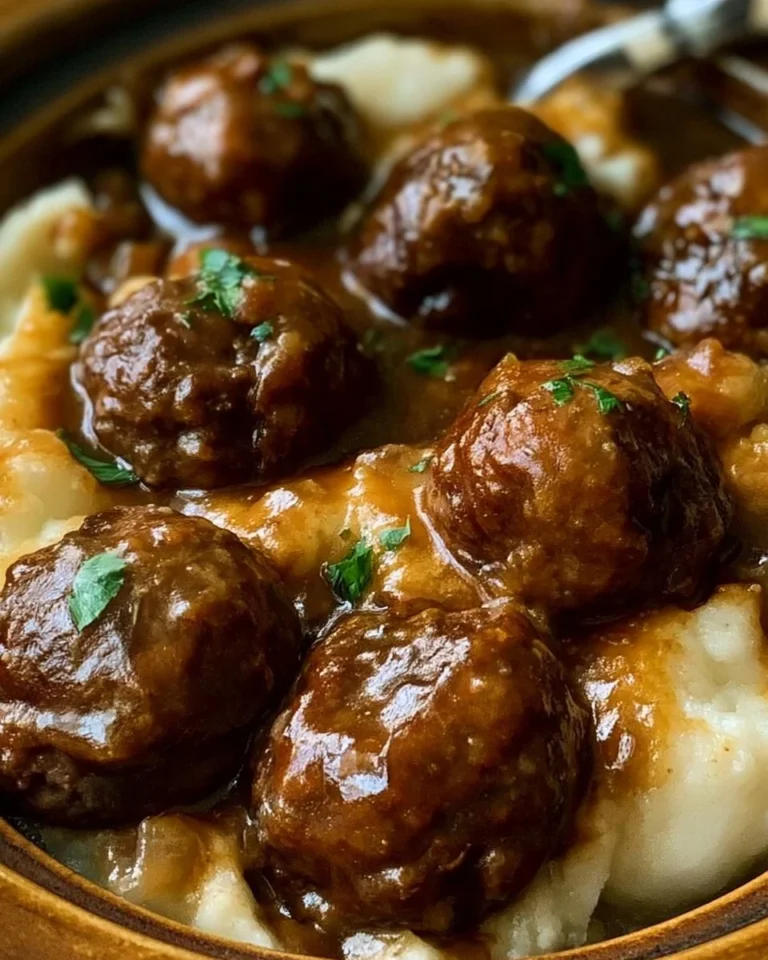 Slow Cooker Salisbury Steak Meatballs served with rich gravy and sides.